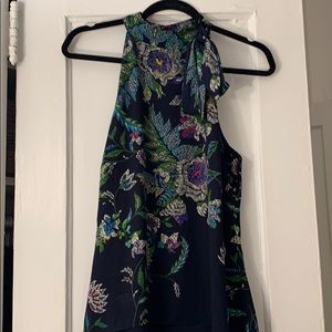 Printed tie front sleeveless blouse